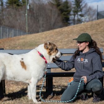 Woman outside with a dog